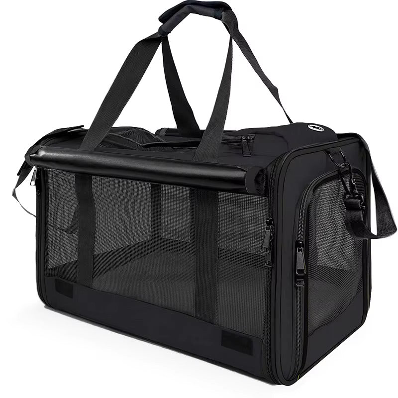 Black pet carrier with mesh sides on a white background