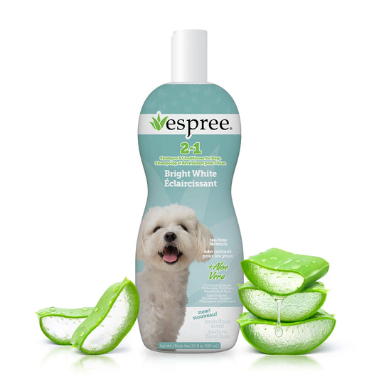 Espree dog shampoo bottle with aloe vera slices on a white background