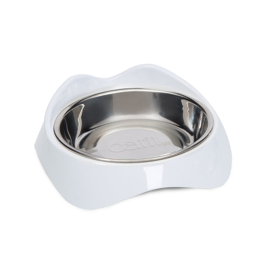 White pet bowl with a stainless steel interior on a white background