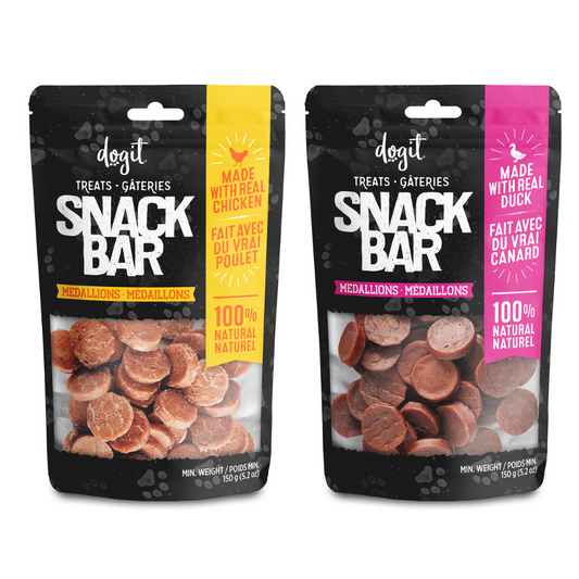 Two packages of dogit Snack Bar treats with chicken and duck flavors on a white background.