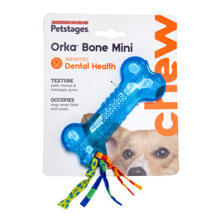 Blue dog chew toy with colorful strings on Petstages packaging